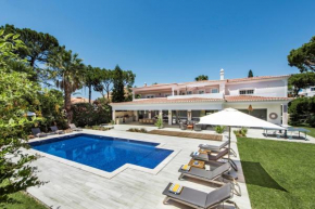 Dazzling Almancil Villa | Villa Magorian | 4 Bedrooms | Spacious Furnished Sun Terrace | Private Outdoor Pool | BBQ Facilities | Shaded Outdoor Dining Area | Private Garden | Quinta Do Lago